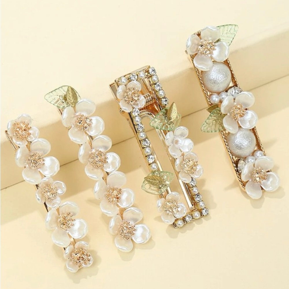 Four bran new hair barrettes .